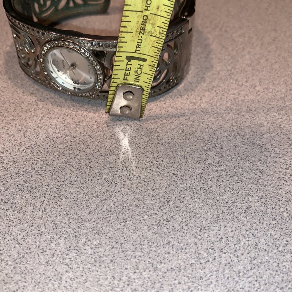 Very Comfortable Hinge Cuff Quartz Watch with Faux Stones Around Face - Picture 8 of 8